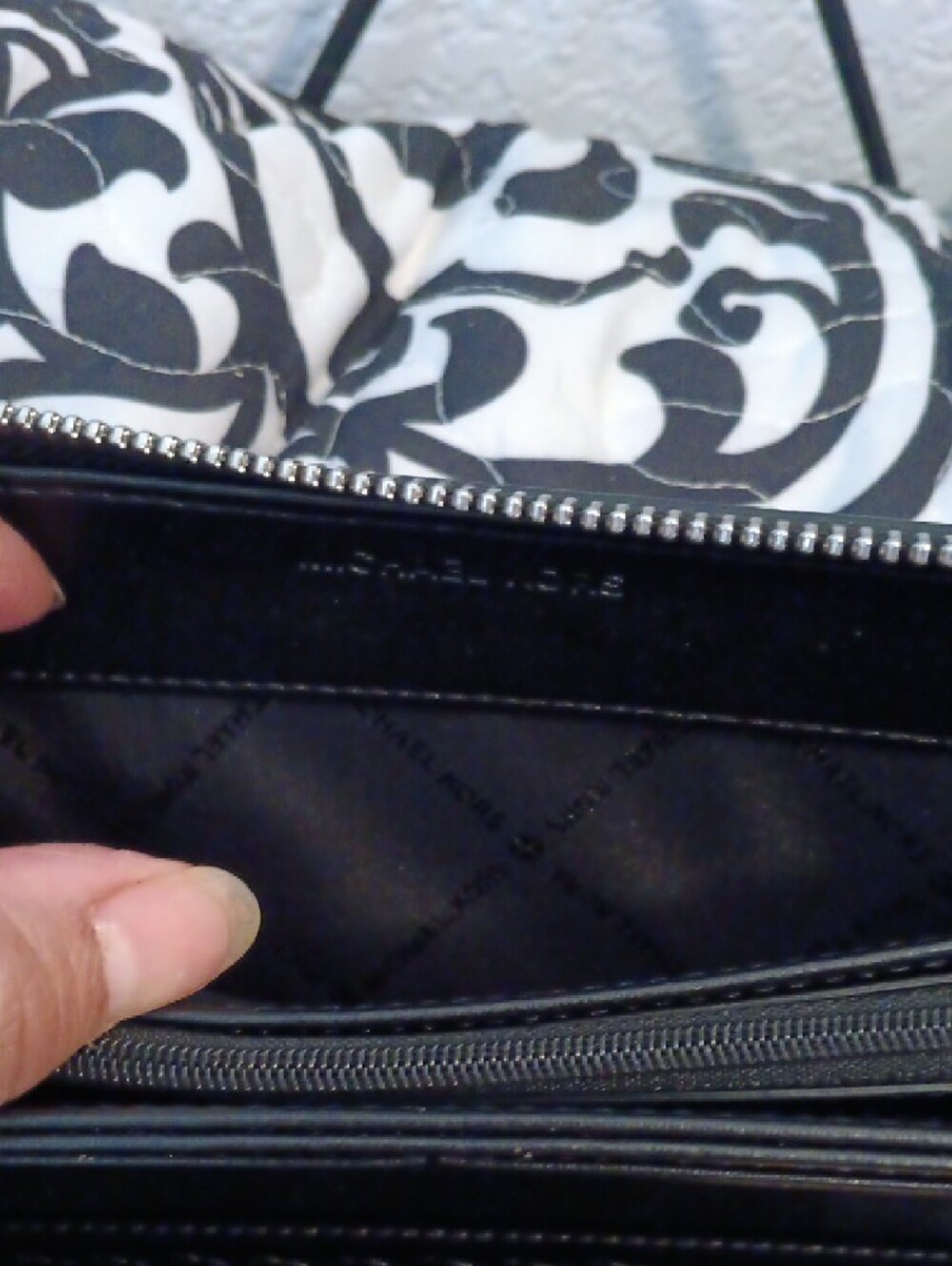 Michael Kors Black Leather Wristlet with Silver Hardware - Picture 10 of 16